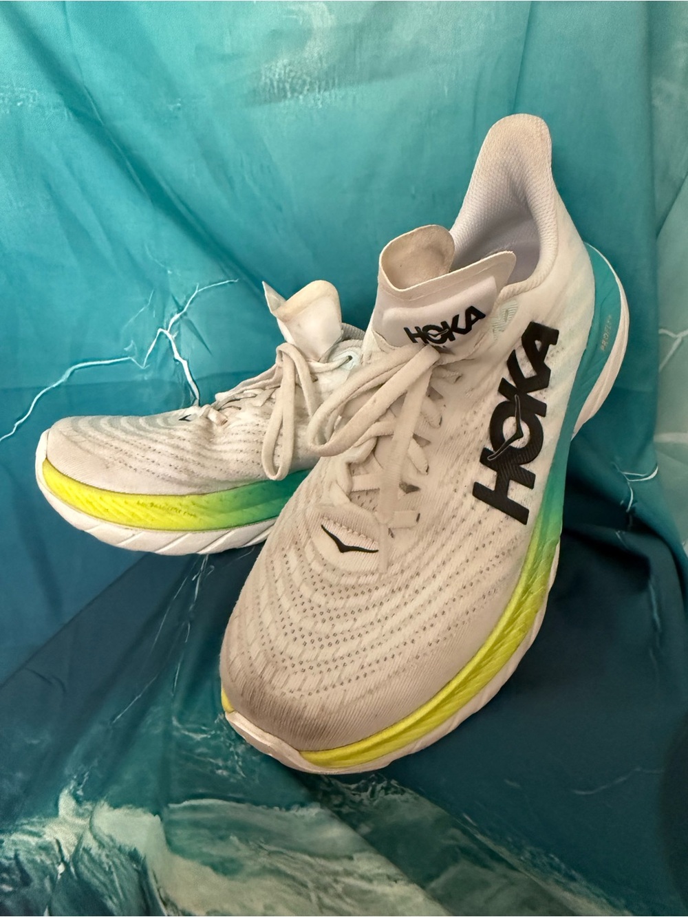 Hoka White Running Shoes with Neon Yellow and Teal Accents
